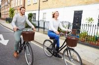 people on bike in a city