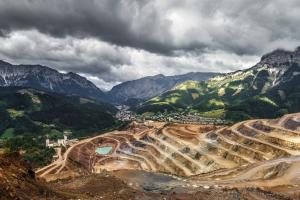 Open cast mine in mountain landscape